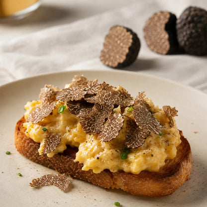 Fresh Black Autumn Truffle shaved on gourmet dish for chefs and autumn restaurant menus